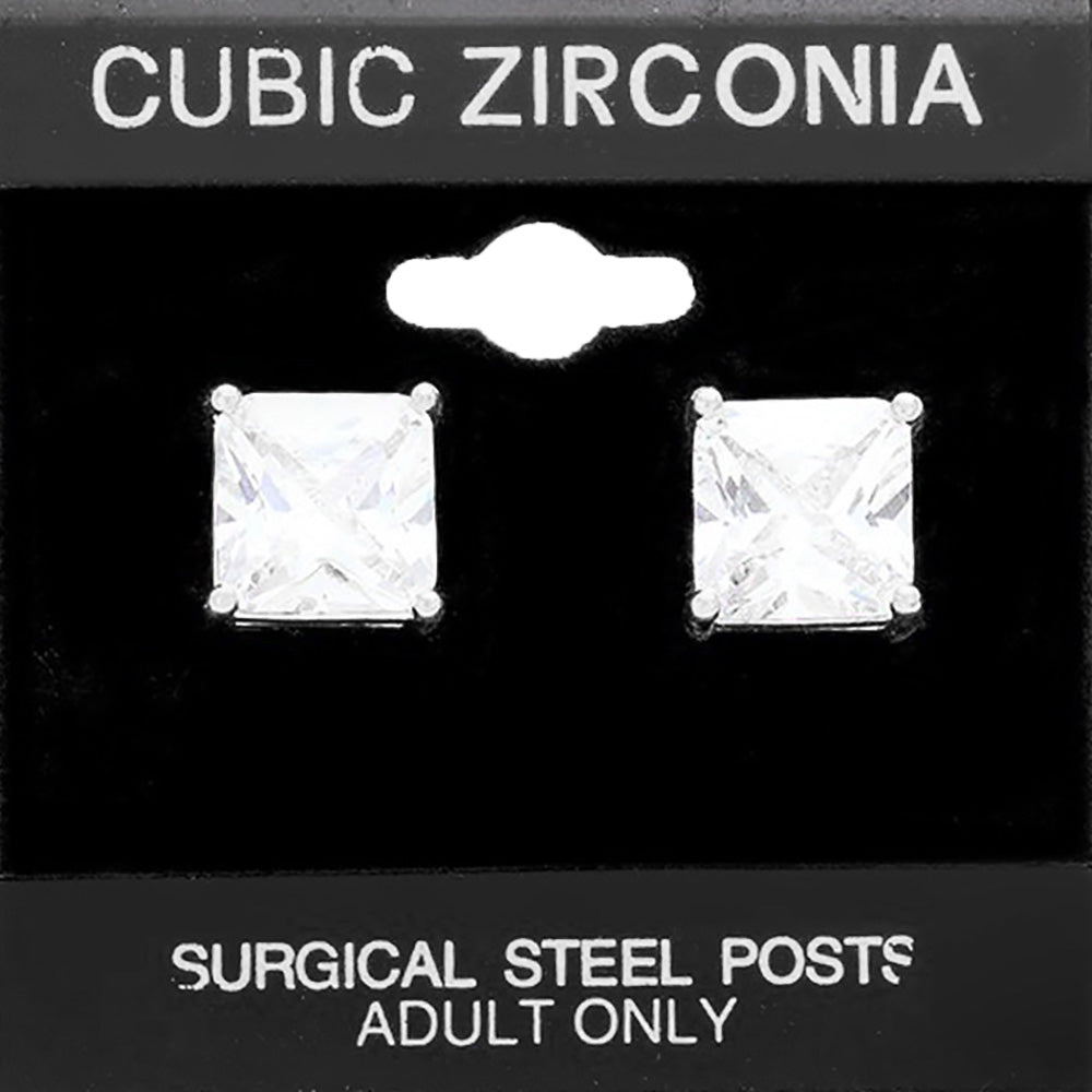 Classic square clear crystal stud earrings in a silver finish with four-prong settings and surgical steel posts, displayed on a black jewelry card.