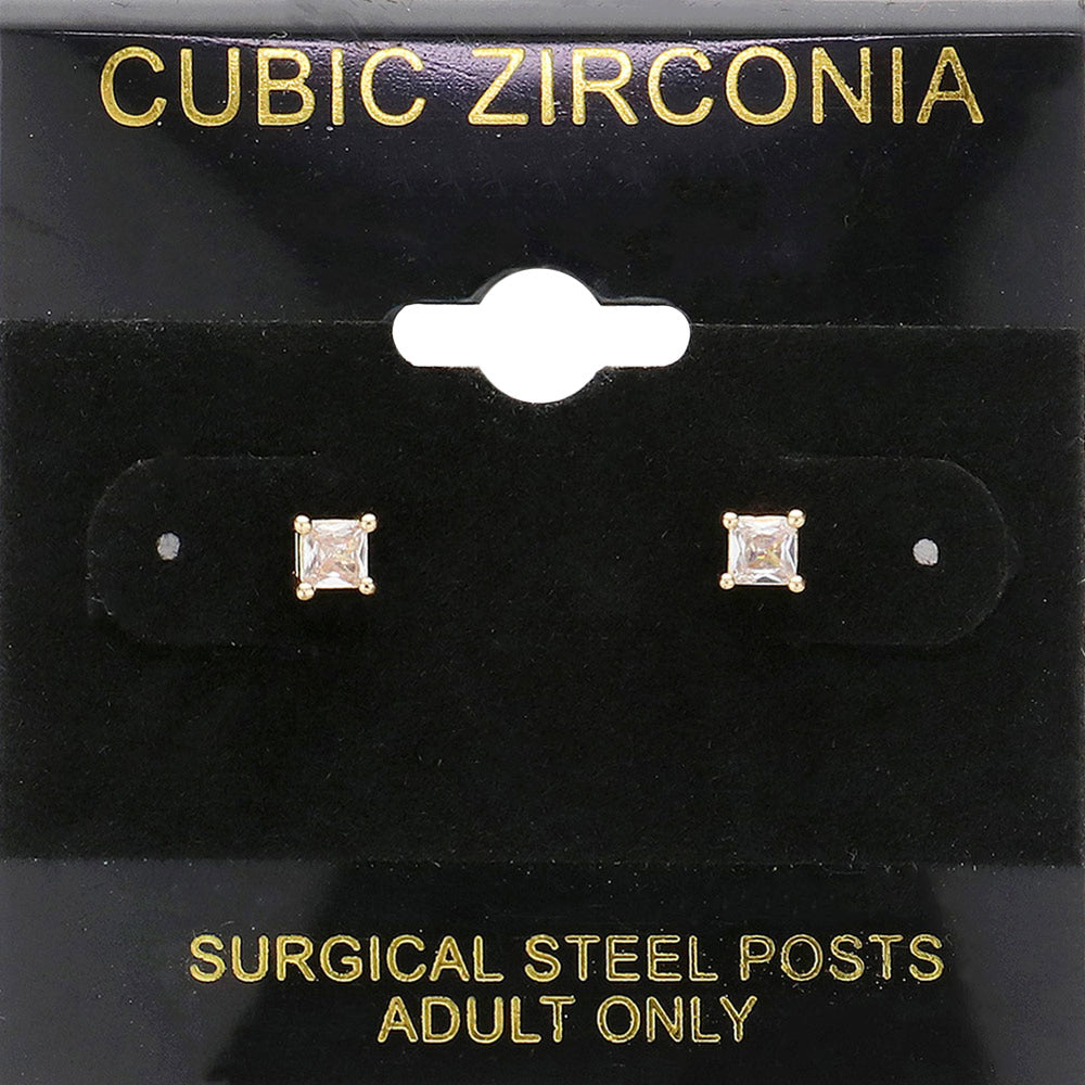 Classic square clear crystal stud earrings in a silver finish with four-prong settings and surgical steel posts, displayed on a black jewelry card.