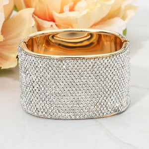 Decorative item with rhinestone embellishments on a light background