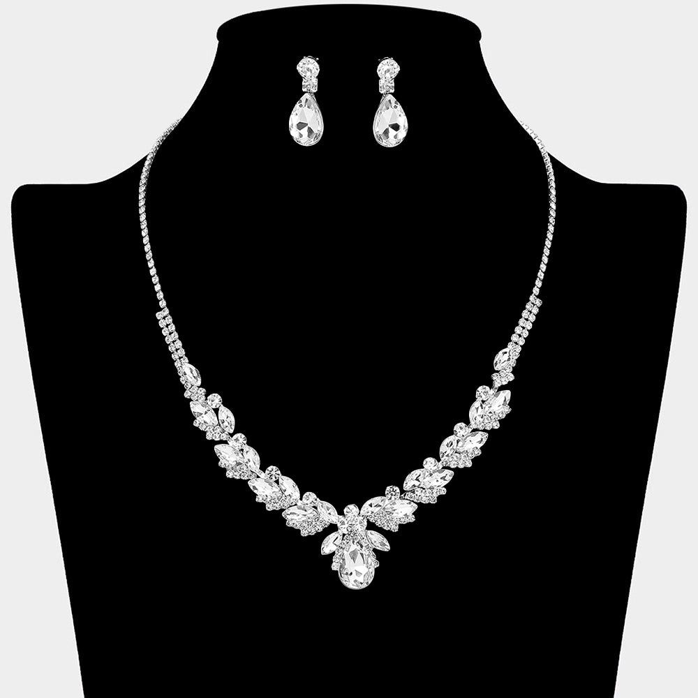 Clear teardrop marquise prom necklace set on silver with matching earrings displayed on a black mannequin bust on a white background.