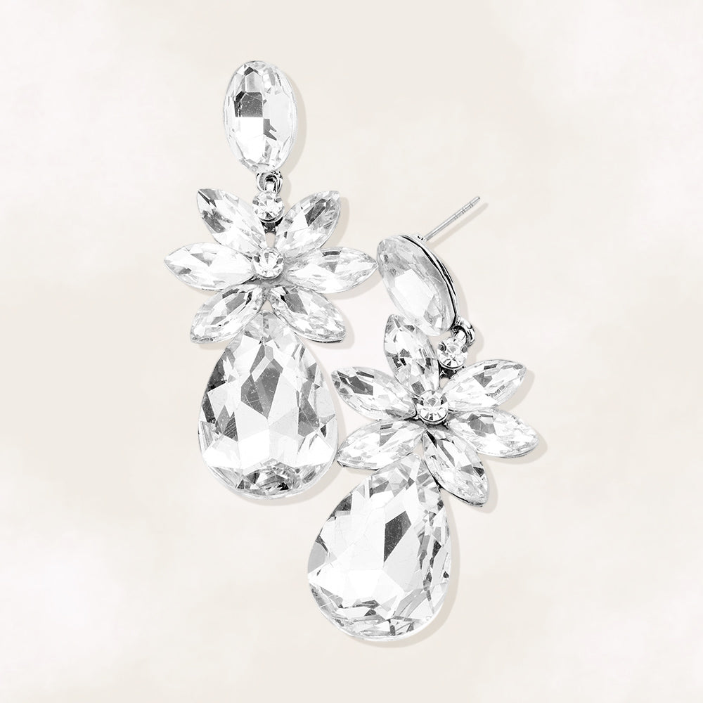 Clear crystal flower teardrop earrings on silver displayed on white background