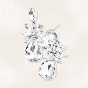 Clear crystal flower teardrop earrings on silver displayed on white background