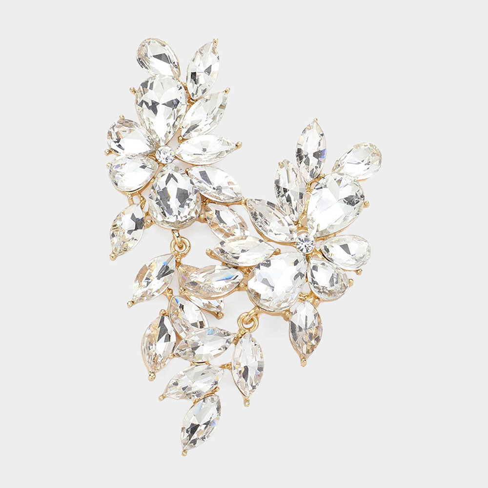 Clear crystal marquise statement earrings on gold with a cascading arrangement of faceted marquise stones, displayed on a white background.