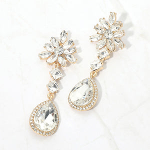 Clear crystal flower teardrop earrings in a gold finish featuring marquise crystal flower tops and large faceted clear crystal teardrop drops, displayed on a white background.