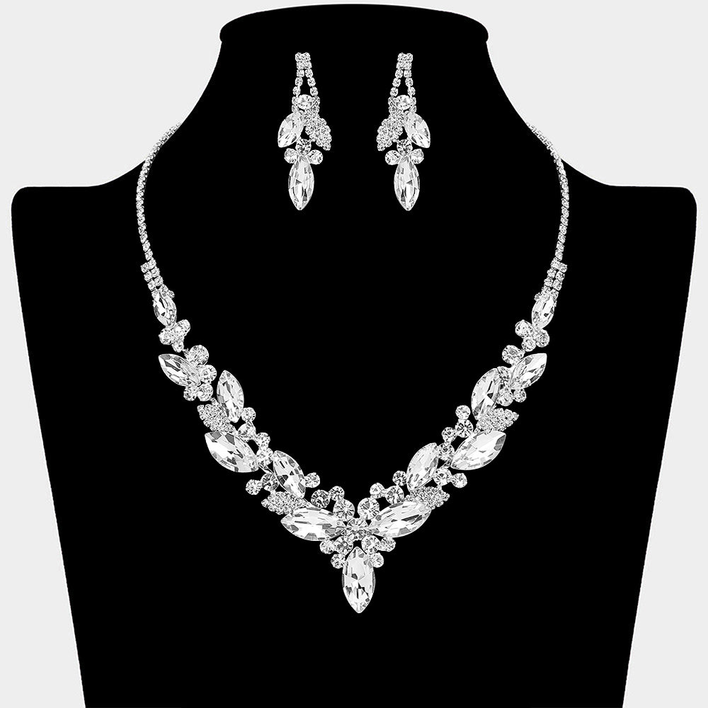 Clear marquise crystal cluster statement necklace set with matching earrings on silver, shown on a black mannequin bust on a white background