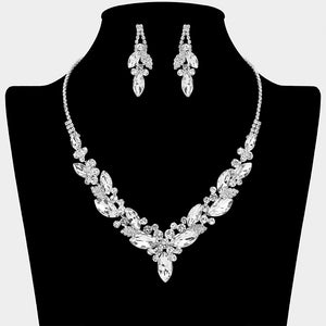 Clear marquise crystal cluster statement necklace set with matching earrings on silver, shown on a black mannequin bust on a white background