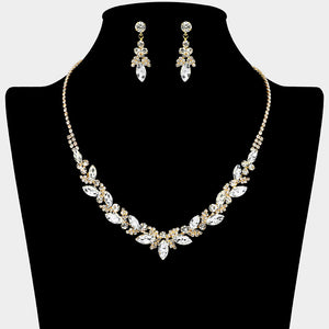 Clear marquise leaf rhinestone necklace set on gold displayed on black bust background