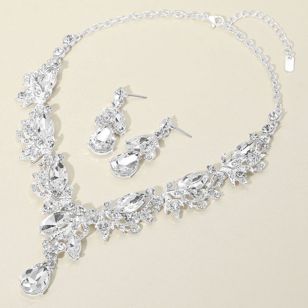 Clear Multi Stone Evening Necklace Set silver backed on a cream background