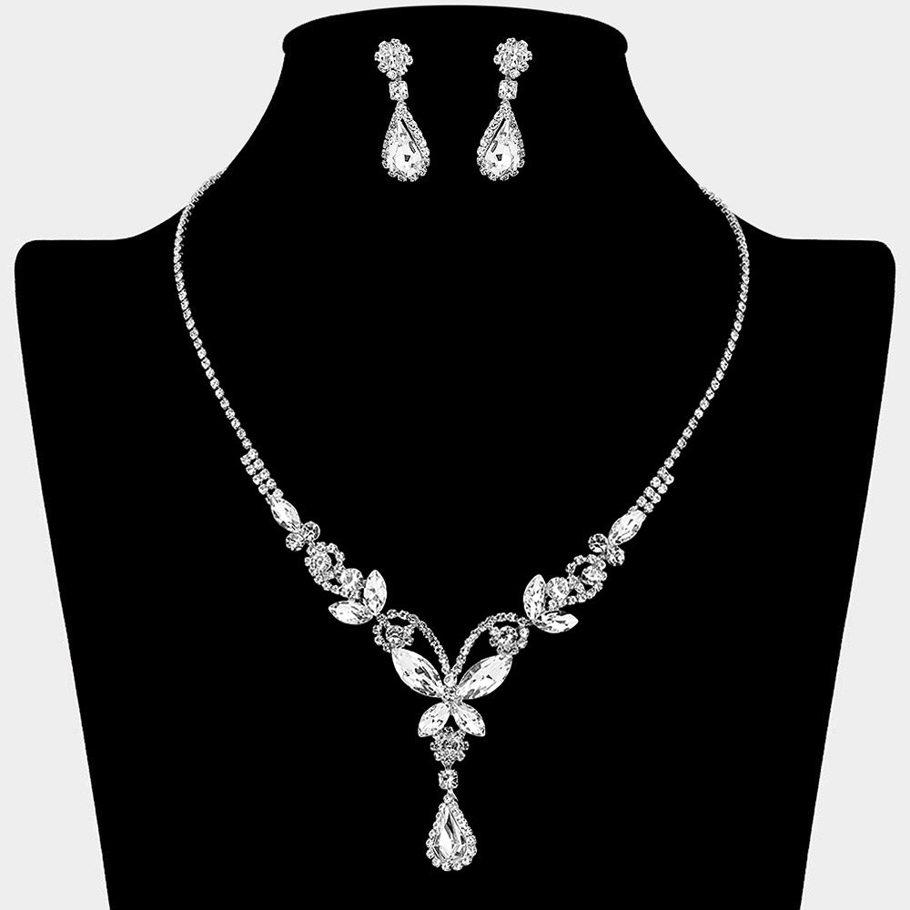 Clear teardrop butterfly rhinestone necklace set on silver displayed on black bust background