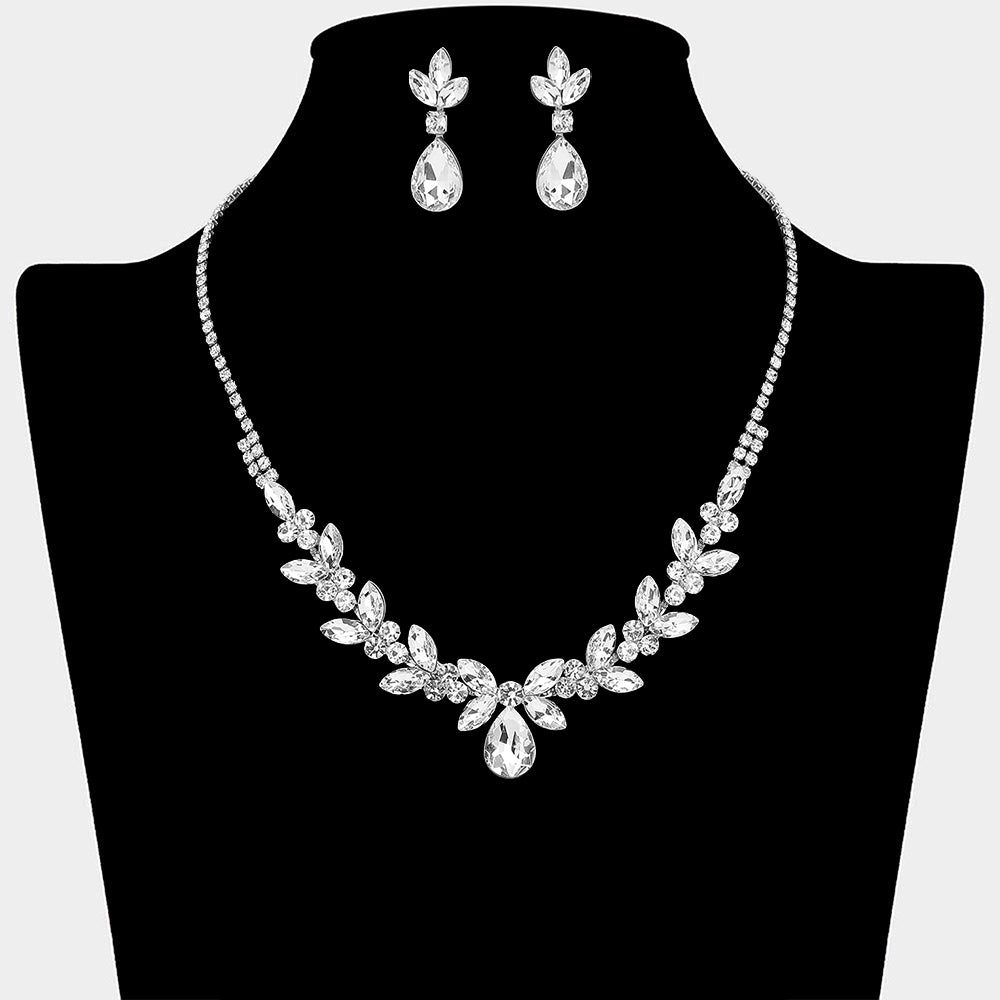 Clear teardrop marquise leaf prom necklace set on silver with matching earrings displayed on a black mannequin bust on a white background.
