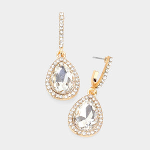 Clear teardrop rhinestone trim dangle earrings on gold on white background