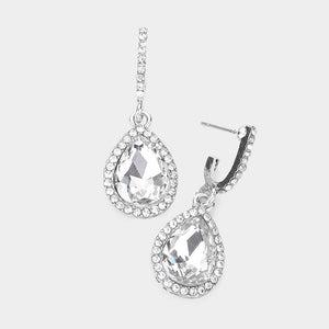 Clear teardrop rhinestone trim dangle earrings on silver on white background