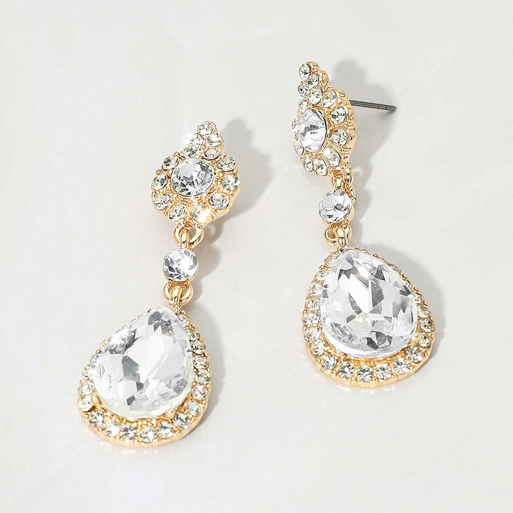 Clear teardrop vintage crystal drop formal and evening earrings on gold on white background