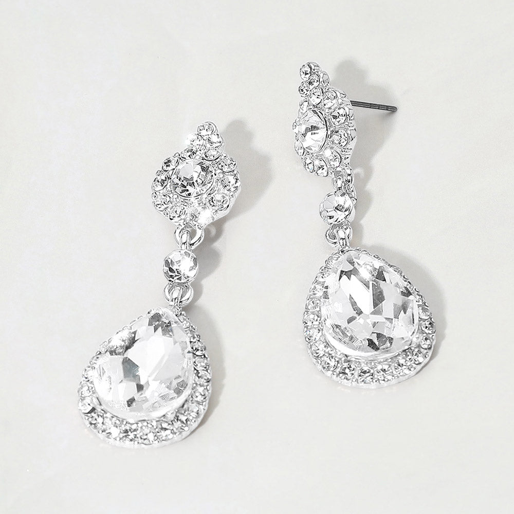 Clear teardrop vintage crystal drop formal and evening earrings on silver on white background