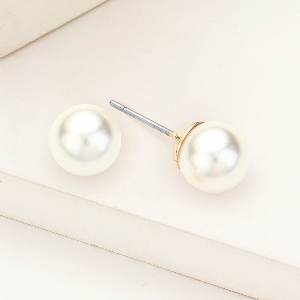 Cream pearl stud earrings 0.3 inch 8mm on gold on beige background