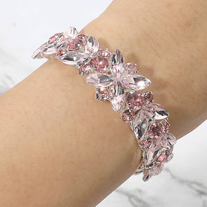 Pink marquise floral crystal bracelet on silver with adjustable fit, styled for prom and evening wear. Shown here on a model's wrist. 