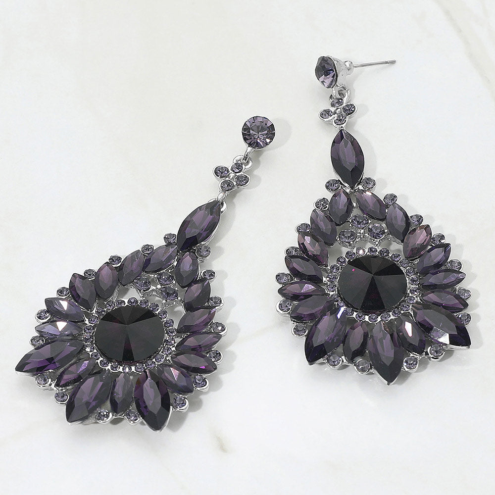 Purple marquise and round teardrop statement earrings for prom or pageant evening wear on a white background