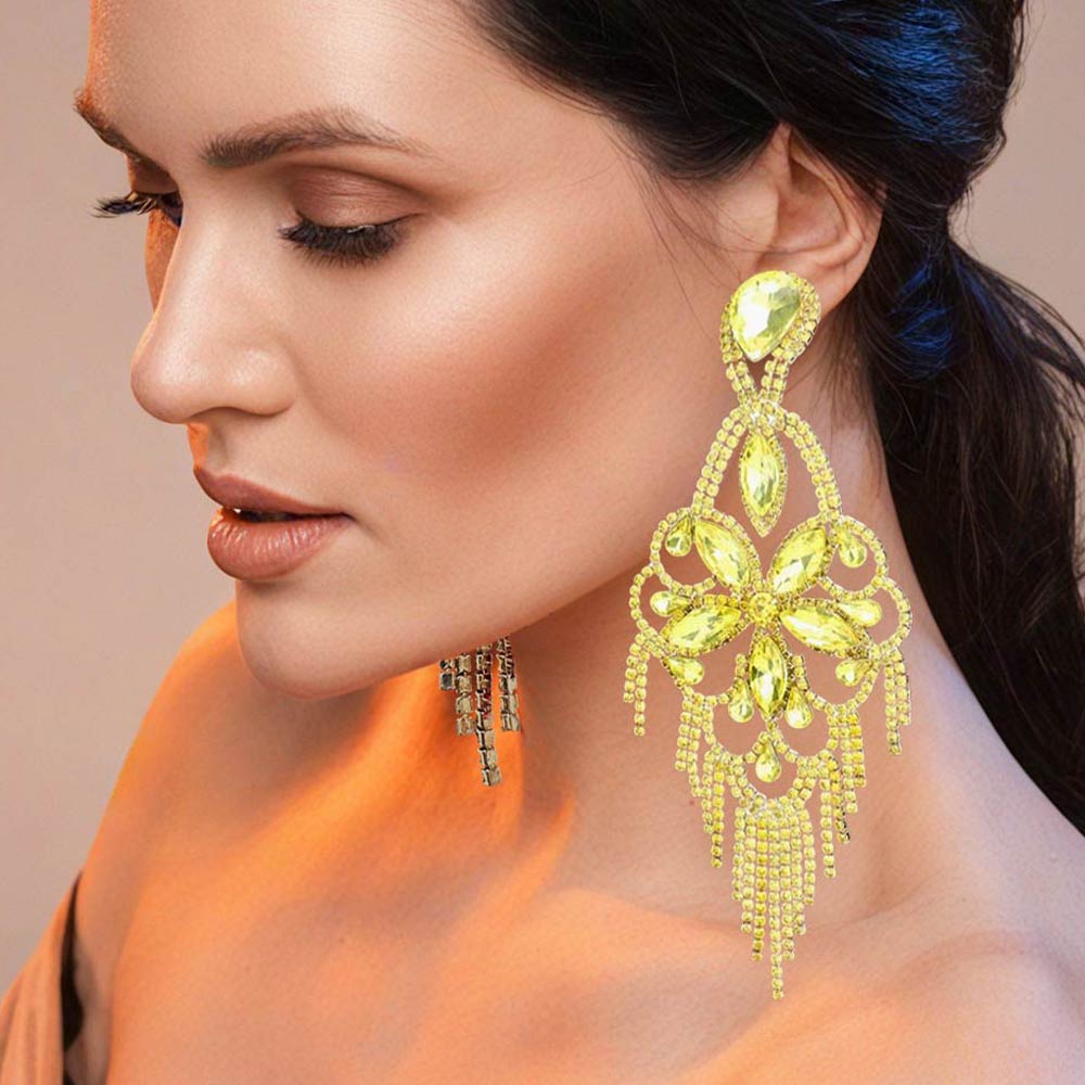 Very large yellow crystal flower fringe pageant earrings on gold worn by model for pageant styling