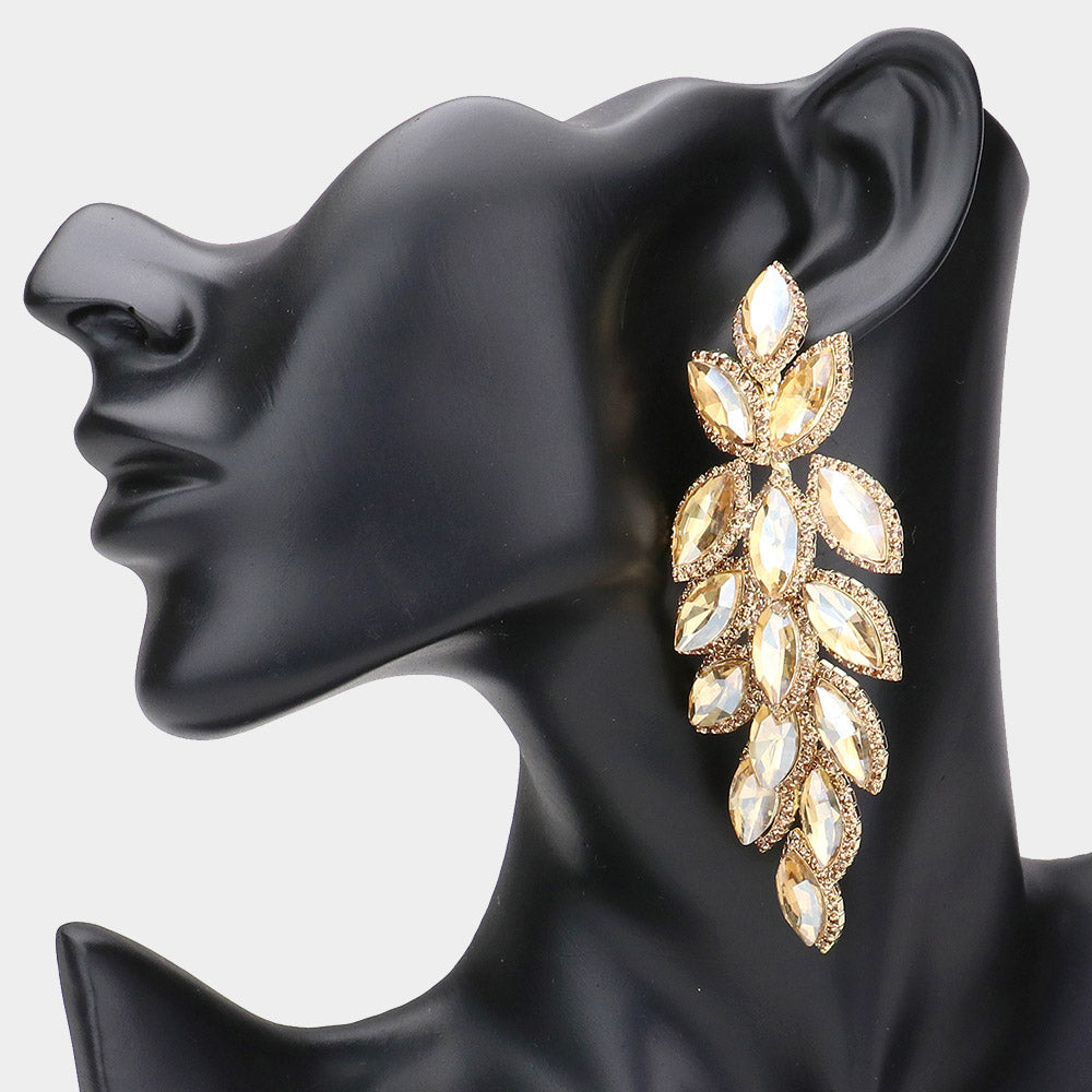 Long Light Topaz Gold Stone crystal marquise leaf earrings on gold shown on a mannequin's ear