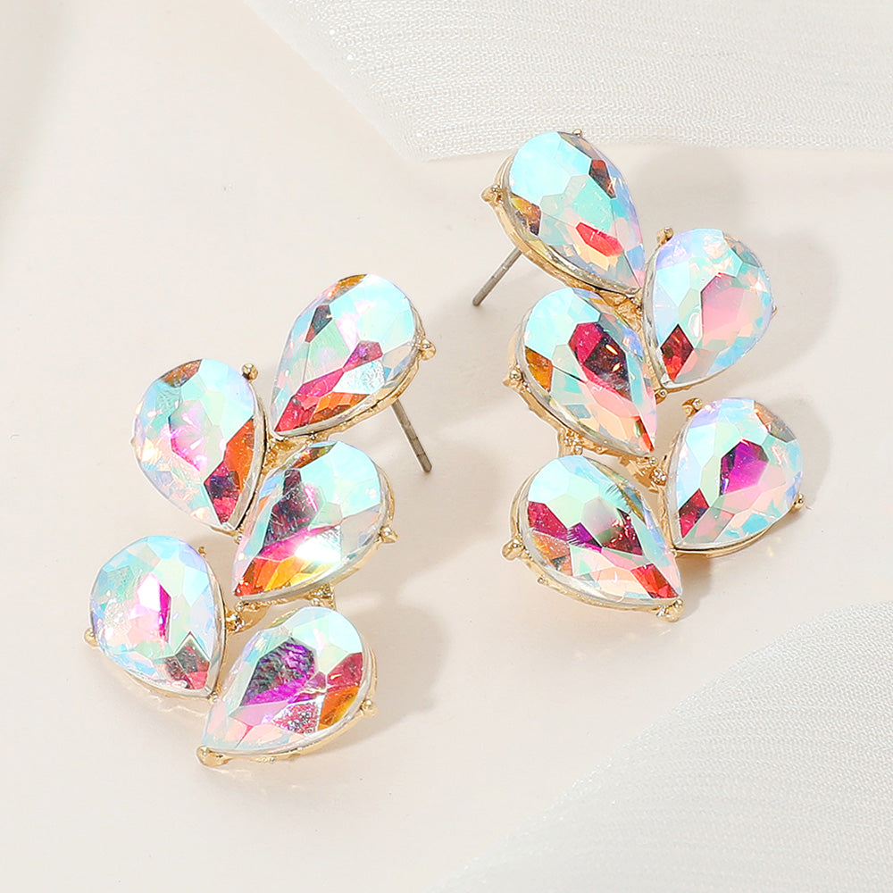 AB teardrop cluster earrings on gold with rainbow shimmer for pageants on a light background.