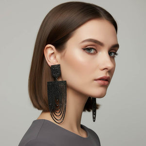 Long Draped Jet Black Rhinestone Pageant Earrings on Black shown here on a model