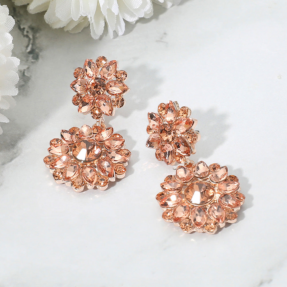 Peach gold stone floral cluster earrings on rose gold for weddings or pageants on a white background