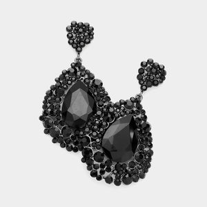 Chunky black teardrop statement earrings with dramatic sparkle, large prom and pageant style on a white background