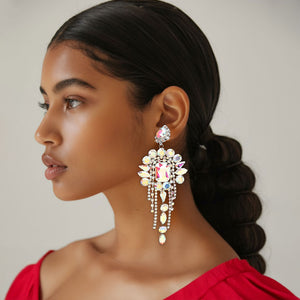 Long 4.6" AB on silver chandelier fringe earrings on a pretty lady on a white background — dramatic crystal statement jewelry for pageant, prom, weddings, and evening events.