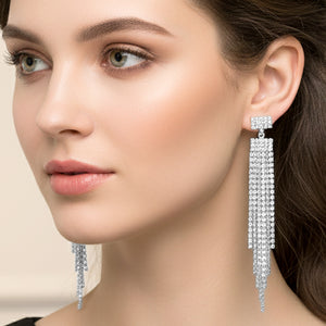 Long clear rhinestone tassel fringe earrings on silver worn by model