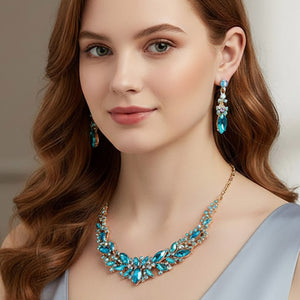 Model wearing Blue AB marquise stone cluster prom and evening necklace set on gold