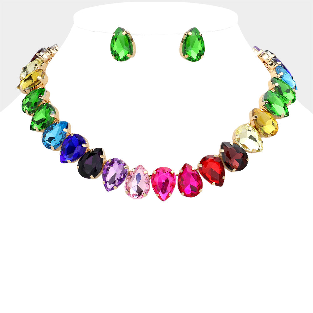 Multi-color teardrop crystal prom necklace set on gold displayed on white mannequin bust