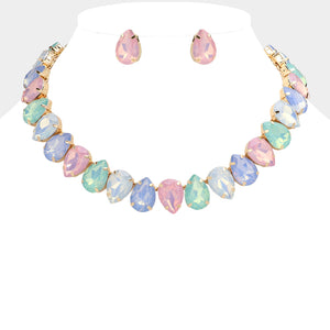 Multi-color pastel teardrop crystal prom necklace set on gold displayed on white mannequin bust