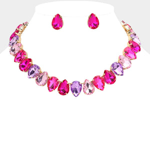 Pink and Fuchsia Hot Pink teardrop crystal prom necklace set on gold displayed on white mannequin bust
