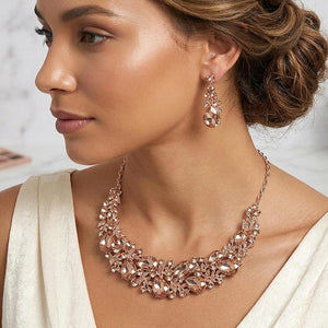 Light Pink teardrop statement necklace set on model with matching earrings on silver