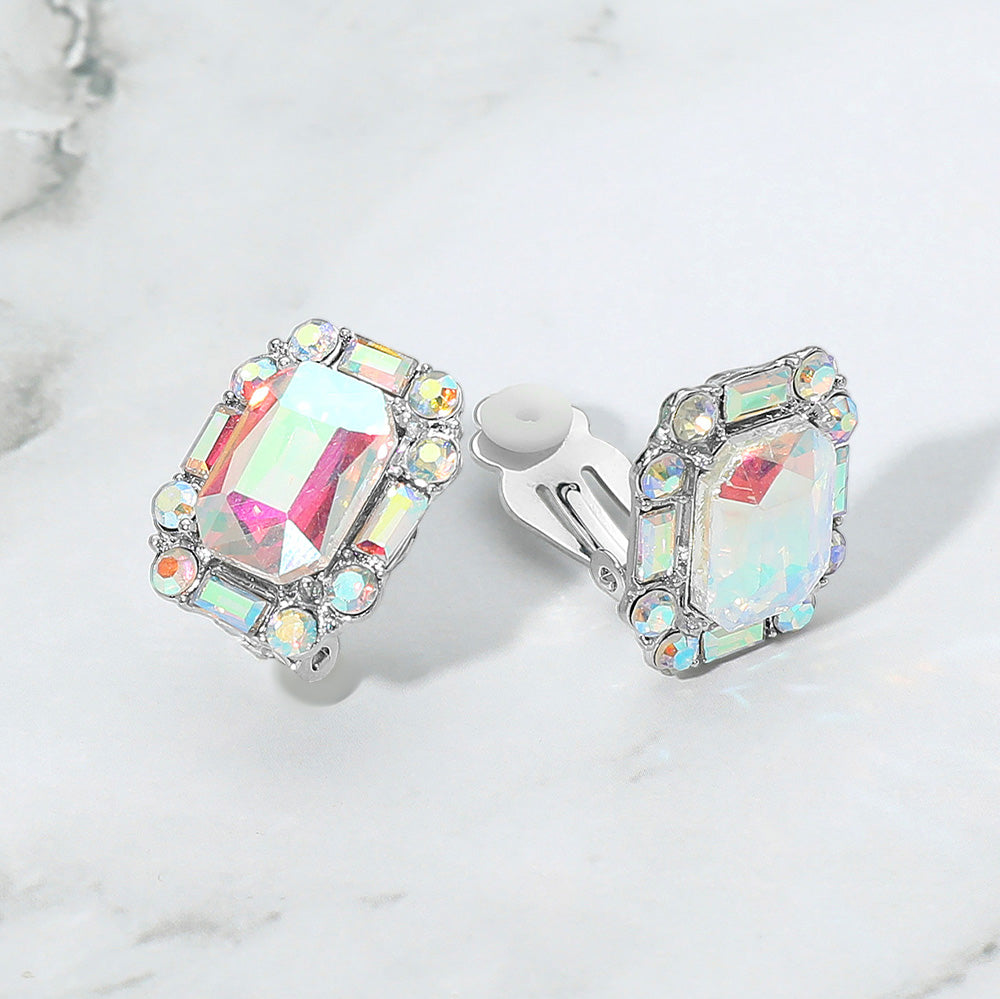Emerald Cut AB Stone Clip On Earrings silver backed on a grey and white granite background