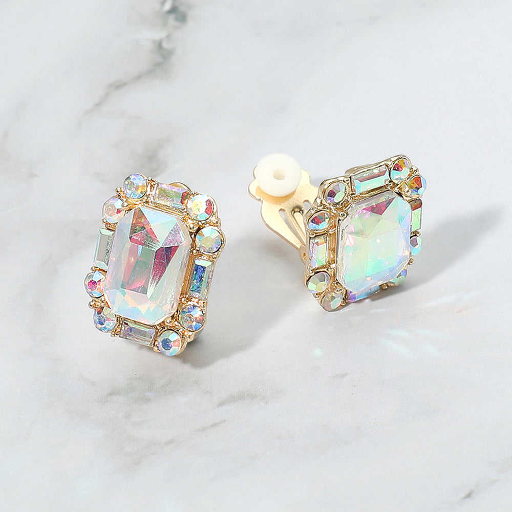 Emerald Cut AB Stone Clip On Earrings gold backed on a grey and white granite background