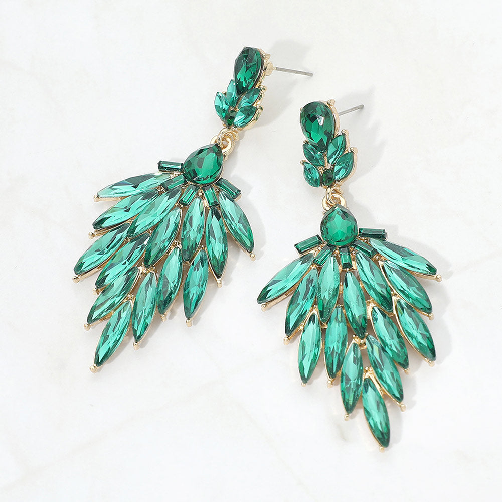 Emerald green marquise cluster pageant prom drop earrings in a gold setting on a white background