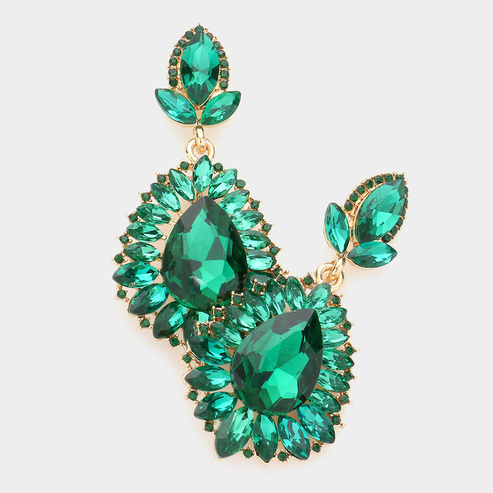 Emerald green teardrop marquise crystal dangle earrings on gold, bold statement earrings for evening and prom wear on a white background