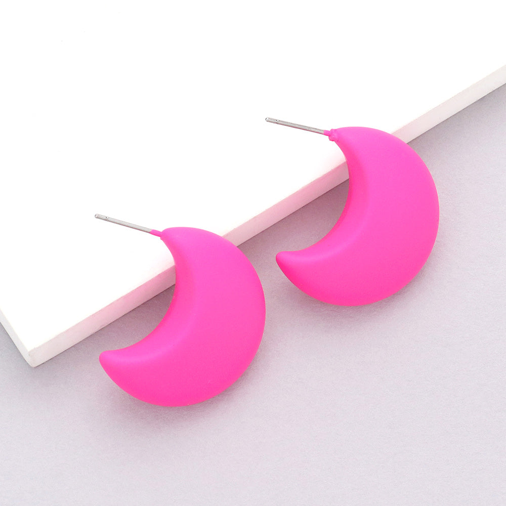 Fuchsia hot pink matte crescent moon earrings on a white background