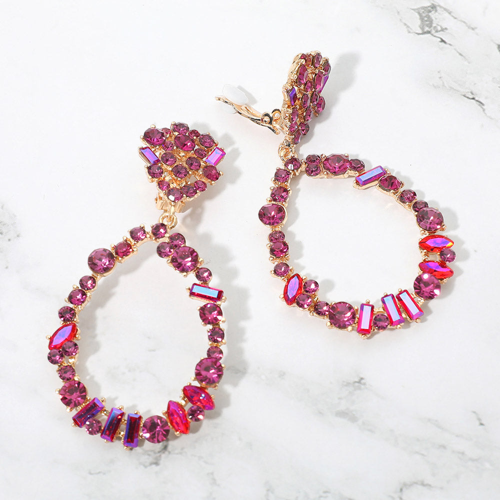 Fuchsia hot pink mixed stone cluster open teardrop clip-on pageant earrings on gold on a white background