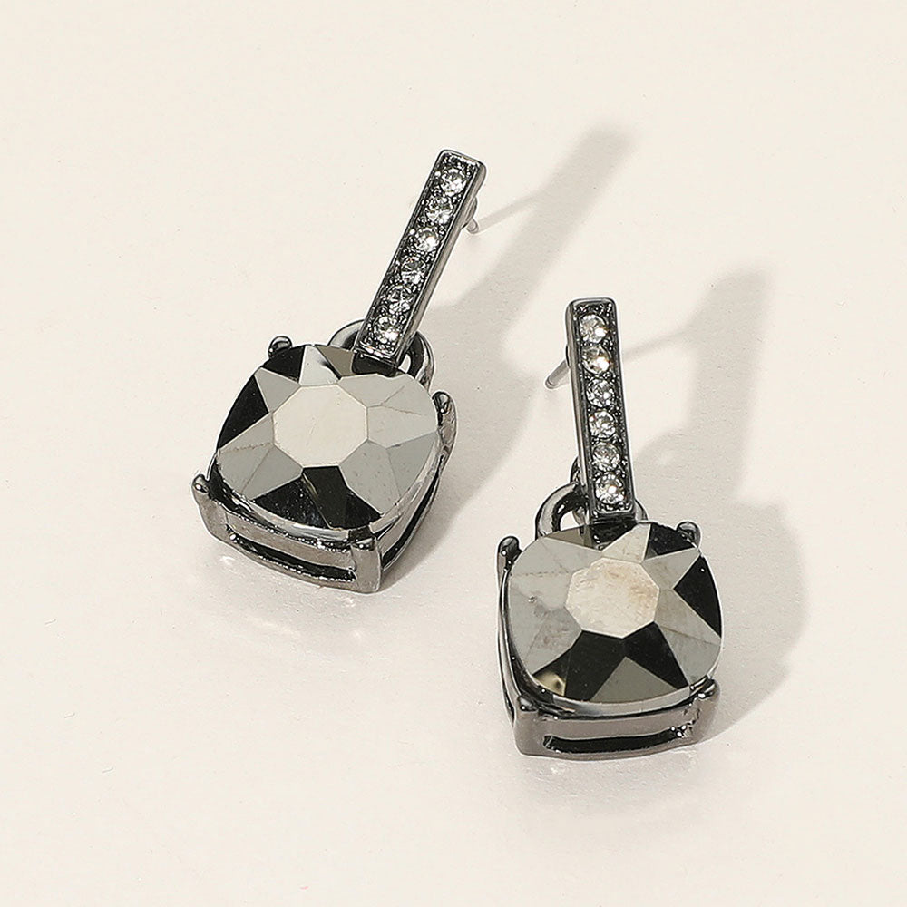 Reflective Grey crystal cushion square dangle earrings on silver with a mirrored faceted cushion-cut stone suspended from a narrow crystal-lined bar, displayed on a white background.