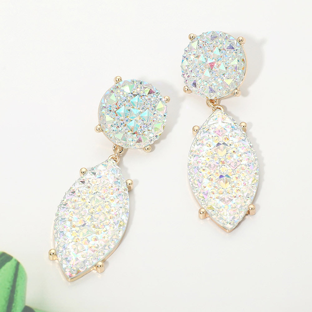 Iridescent white and AB rhinestone marquise drop pageant earrings on gold on a white background
