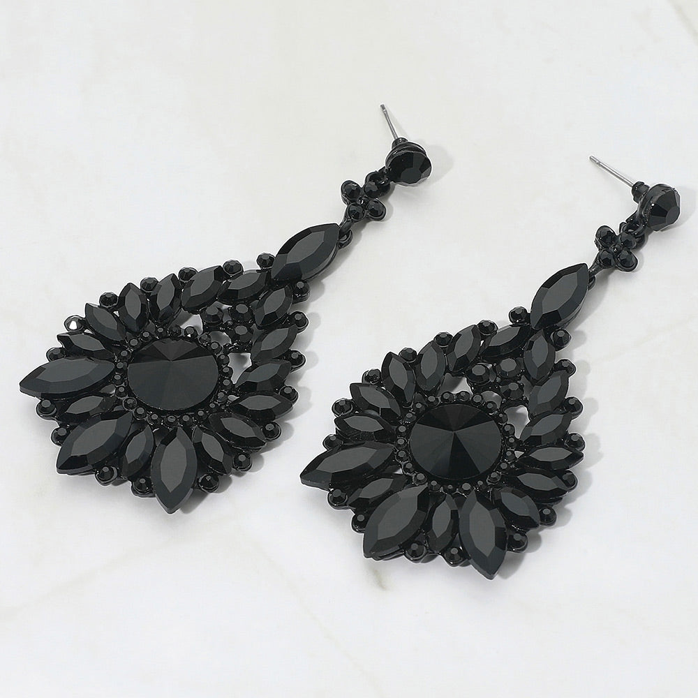 Jet black marquise and round teardrop statement earrings for prom or pageant evening wear on a white background
