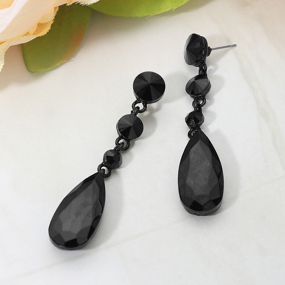 Jet black rhinestone multi stone dangle earrings with teardrop crystal for pageants on a white background