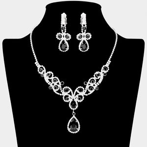 Jet black teardrop crystal rhinestone vine necklace set with clip-on earrings on black bust