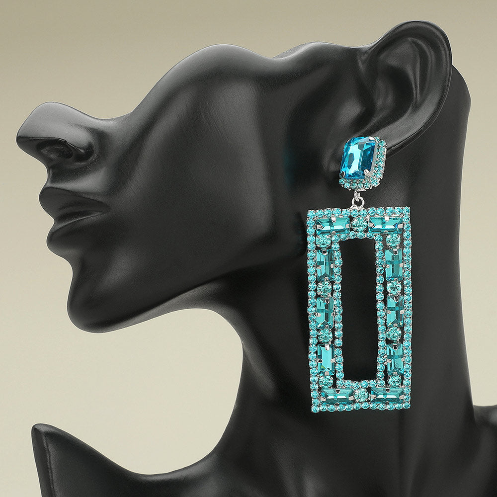Large Aqua Multi Shape Stone Open Rectangle Earrings on black mannequin earlobe