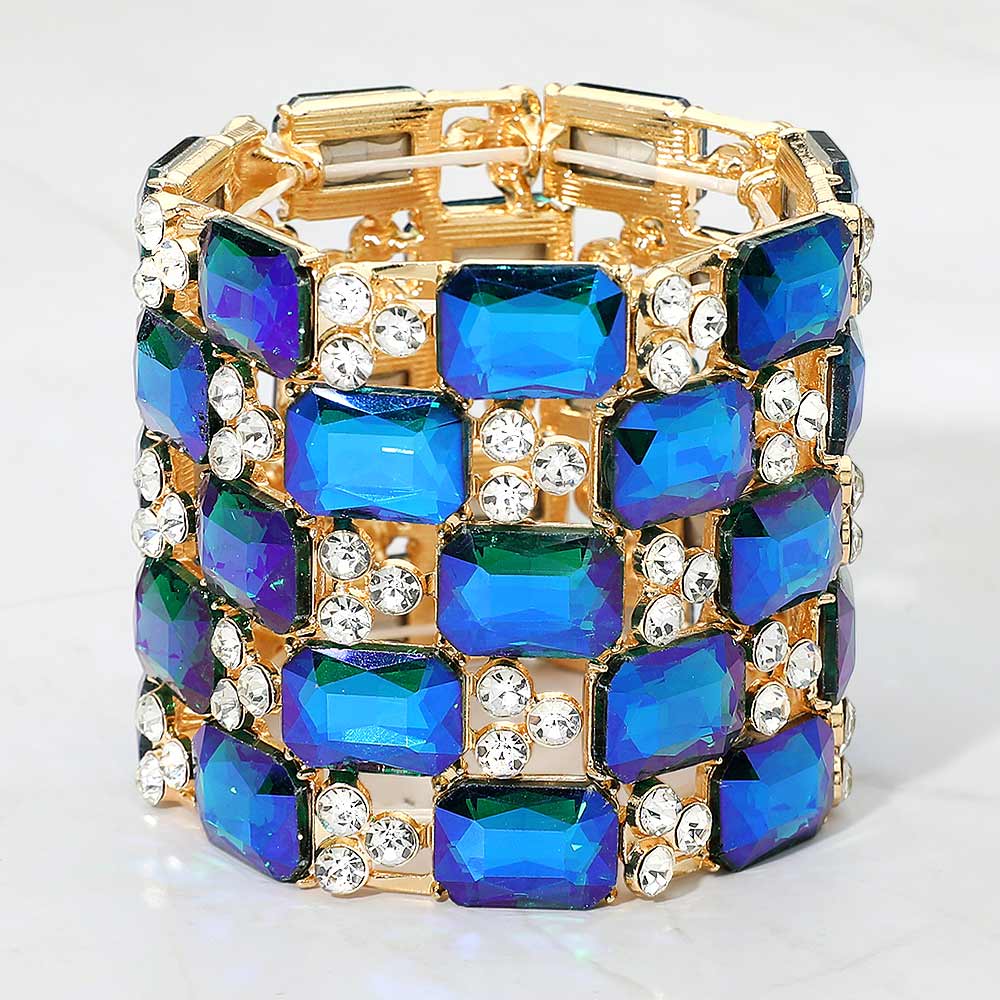Large Blue AB emerald cut crystal stretch pageant bracelet on gold on white background
