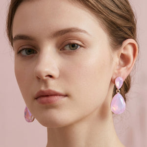 Model wearing lavender opal crystal double teardrop dangle earrings on gold 