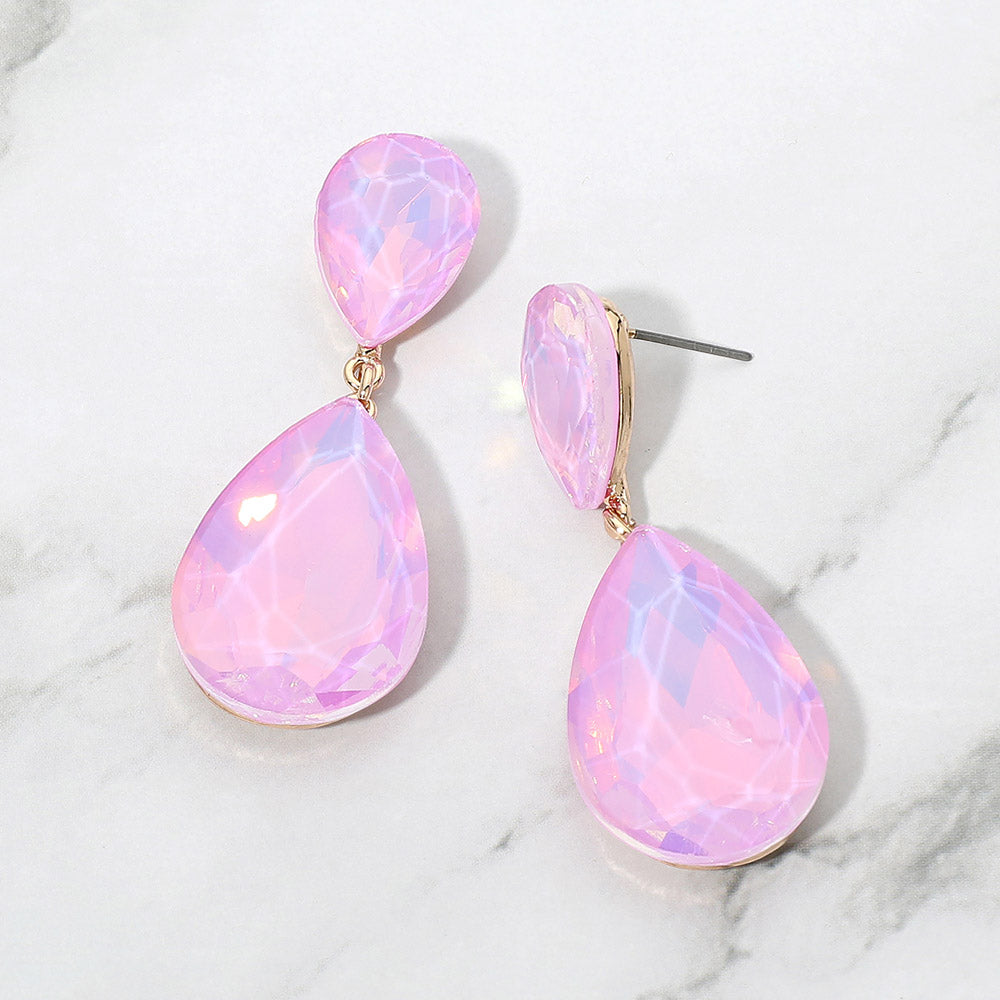 Lavender opal crystal double teardrop dangle earrings on gold displayed on a white marble background.