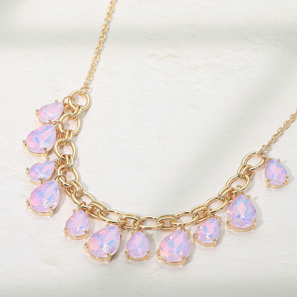 Lavender opal crystal teardrop statement necklace on gold on white background